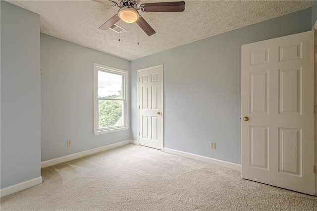 2794 Craig Ct, Marietta, GA 30062 - carpeted spare room featuring a ceiling fan and a textured ceiling