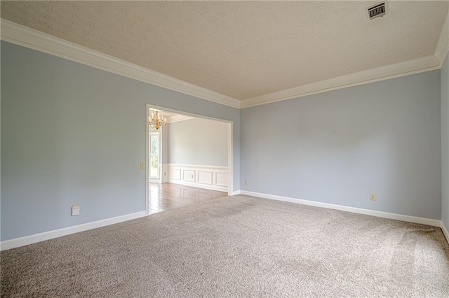 2794 Craig Ct, Marietta, GA 30062 - carpeted empty room with ornamental molding, a chandelier, and a textured ceiling