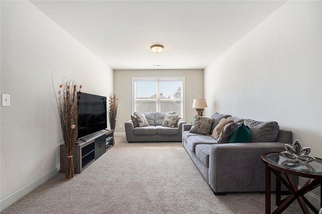 2320 Ridge View Dr, Loganville, GA 30052 - living room featuring carpet and baseboards
