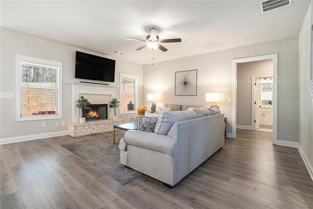 2320 Ridge View Dr, Loganville, GA 30052 - living area featuring ceiling fan, plenty of natural light, and baseboards