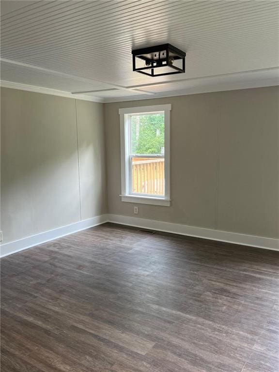 spare room with wood-type flooring