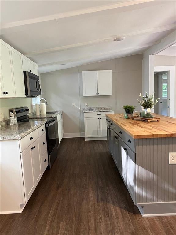 kitchen with white cabinets, electric range, and dark hardwood / wood-style floors