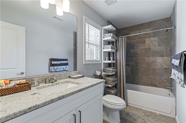 bathroom with toilet, vanity, visible vents, and shower / bathtub combination with curtain