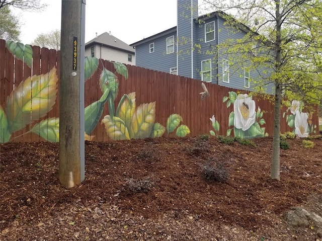 view of yard featuring fence