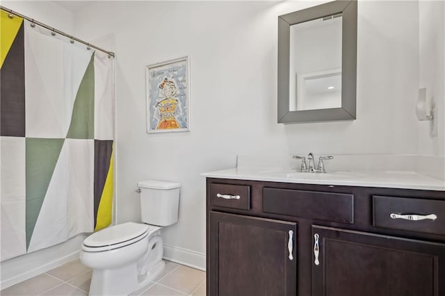 bathroom with tile patterned floors, toilet, curtained shower, baseboards, and vanity