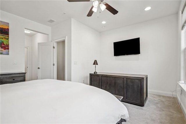 bedroom with recessed lighting, baseboards, visible vents, and light carpet