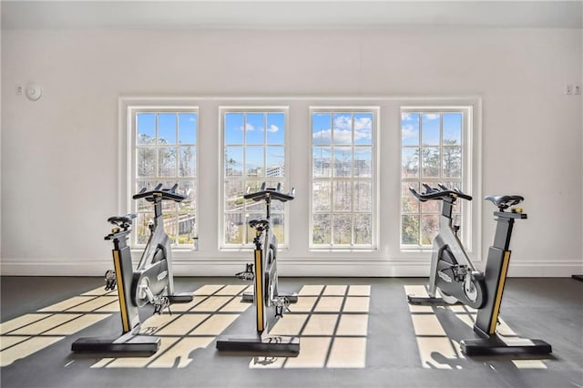 exercise room with baseboards