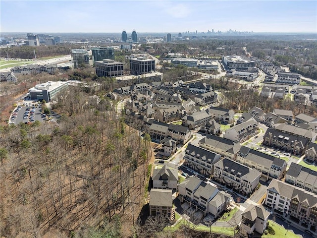 birds eye view of property featuring a city view