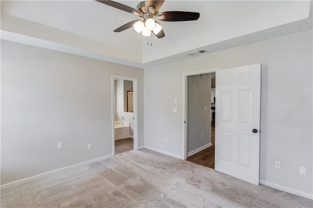 926 Masters Dr, Monroe, GA 30655 - unfurnished bedroom featuring carpet floors, ensuite bath, and a ceiling fan