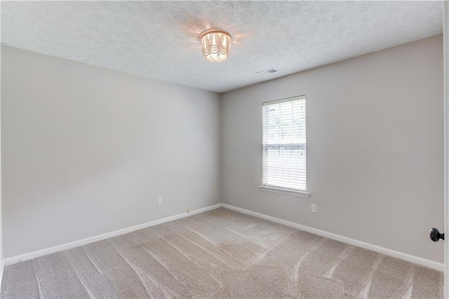 926 Masters Dr, Monroe, GA 30655 - unfurnished room with light colored carpet and a textured ceiling