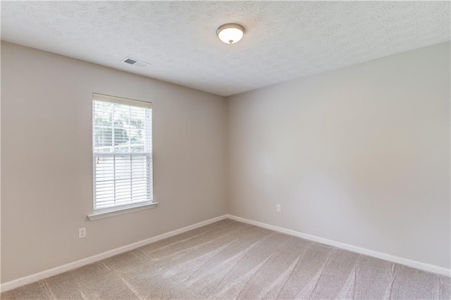 926 Masters Dr, Monroe, GA 30655 - carpeted spare room featuring a textured ceiling
