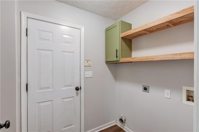 926 Masters Dr, Monroe, GA 30655 - laundry area with hookup for an electric dryer, washer hookup, cabinet space, and dark wood-type flooring