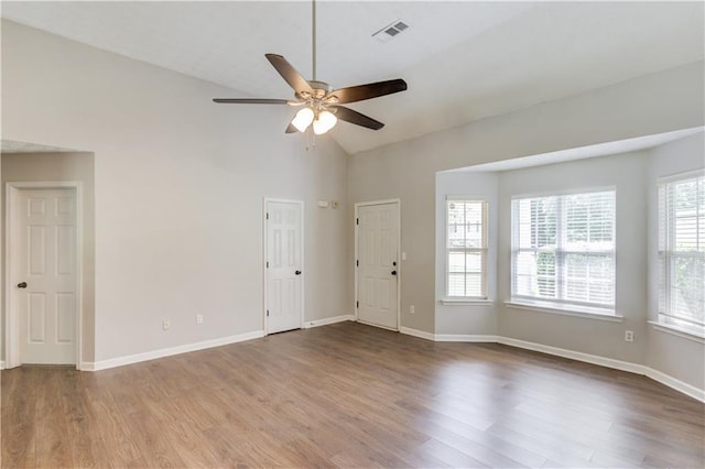 926 Masters Dr, Monroe, GA 30655 - unfurnished room featuring a ceiling fan, wood finished floors, and high vaulted ceiling