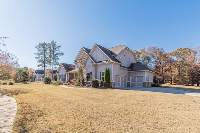 view of front facade with a front lawn and a garage