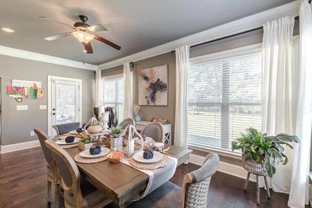 dining area with dark hardwood / wood-style floors, ceiling fan, and ornamental molding