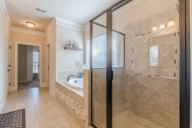 bathroom with tile patterned floors, separate shower and tub, and crown molding