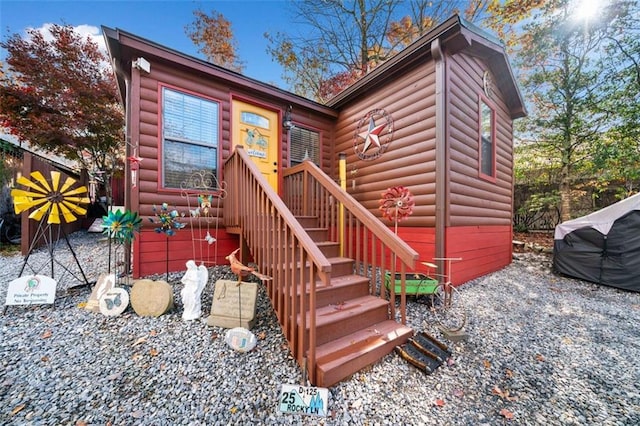 view of log cabin