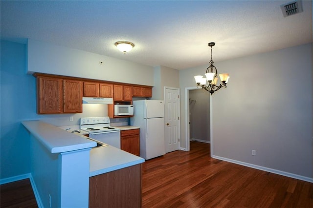 150 Old Mill Rd Unit 115, Cartersville, GA 30120 - kitchen featuring white appliances, under cabinet range hood, brown cabinetry, light countertops, and dark wood-type flooring