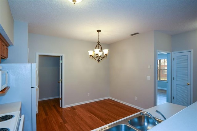 150 Old Mill Rd Unit 115, Cartersville, GA 30120 - dining room with wood finished floors, a chandelier, and a textured ceiling