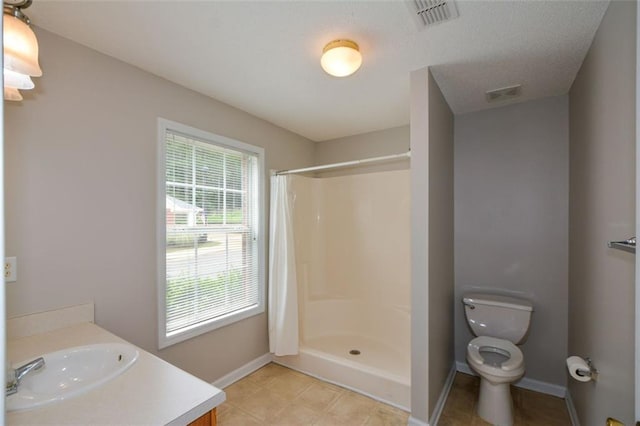 150 Old Mill Rd Unit 115, Cartersville, GA 30120 - bathroom with curtained shower, vanity, and tile patterned floors