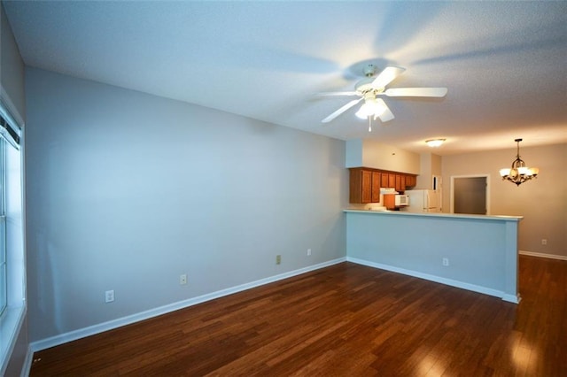 150 Old Mill Rd Unit 115, Cartersville, GA 30120 - unfurnished living room with dark wood-type flooring, a chandelier, and ceiling fan