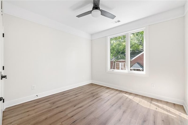 unfurnished room featuring ceiling fan and light hardwood / wood-style flooring