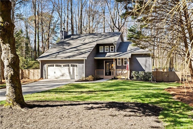 view of front of house featuring a chimney, concrete driveway, a front yard, fence, and a garage