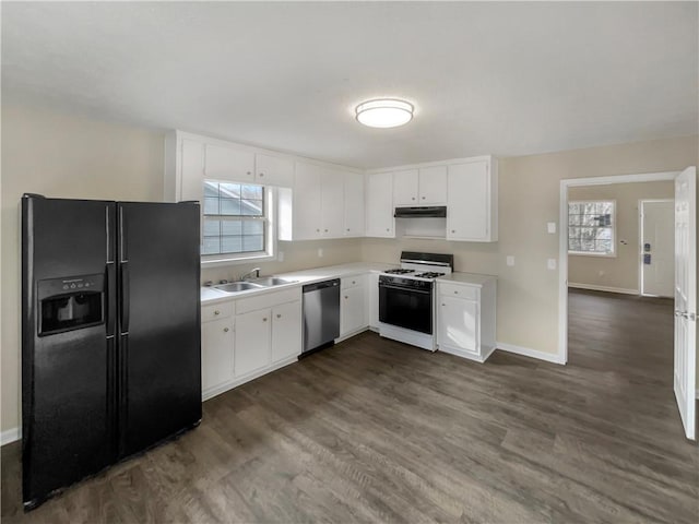 kitchen with dishwasher, white gas range, sink, white cabinets, and black fridge with ice dispenser