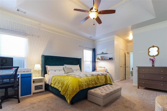 carpeted bedroom with baseboards, visible vents, ceiling fan, and crown molding