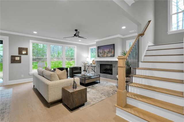 living area featuring light wood finished floors, stairway, visible vents, and recessed lighting