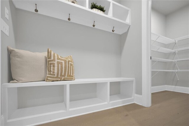 bedroom featuring recessed lighting, a raised ceiling, visible vents, light wood-style flooring, and baseboards