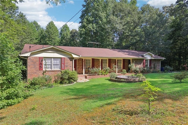 ranch-style house with a front lawn