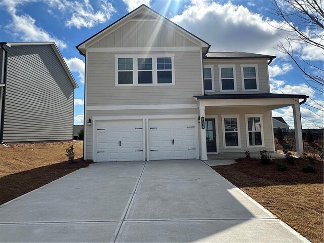 view of front of property with a garage