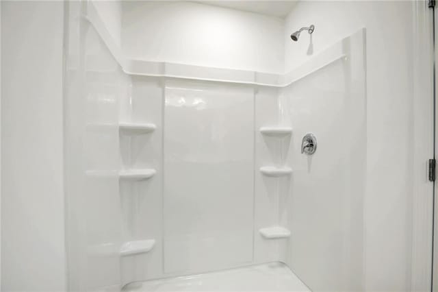 bathroom with a shower