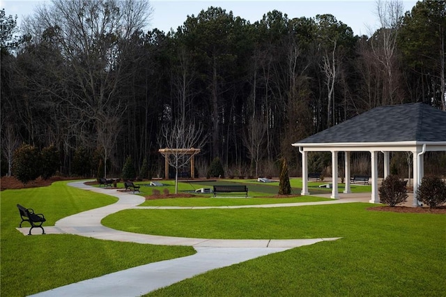 view of home's community with a gazebo and a lawn