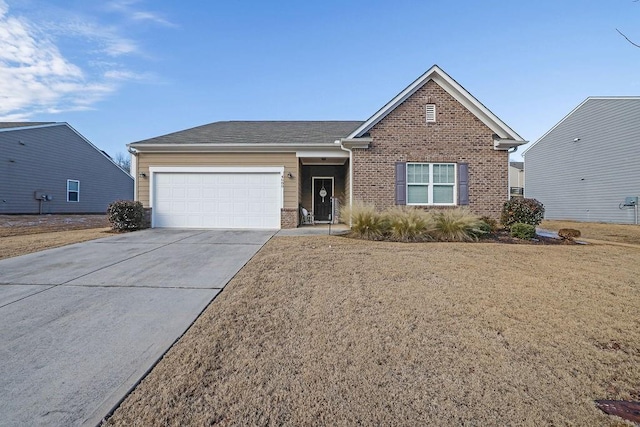 view of front facade with a front lawn and a garage