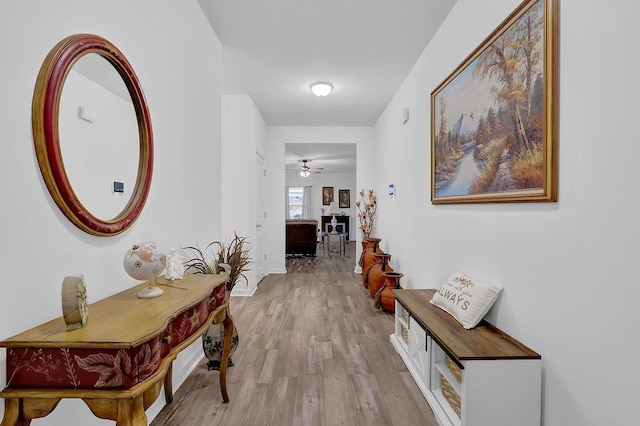 corridor featuring light hardwood / wood-style flooring