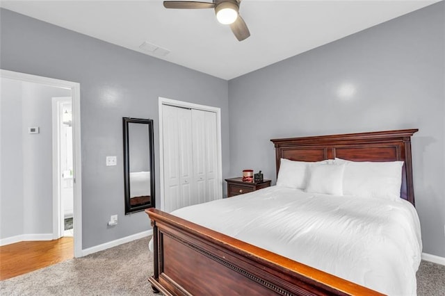 947 Summer Forest Dr, Suwanee, GA 30024 - carpeted bedroom with a closet, baseboards, and a ceiling fan