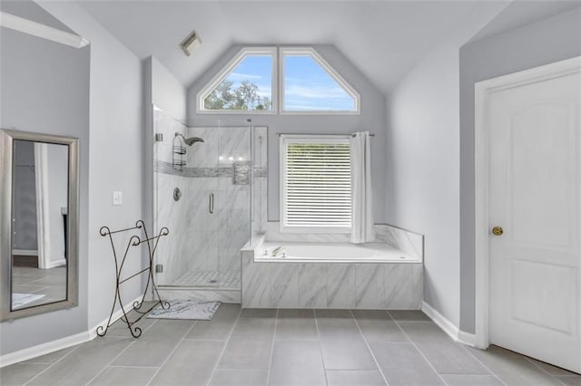 947 Summer Forest Dr, Suwanee, GA 30024 - full bathroom with a garden tub, a shower stall, vaulted ceiling, tile patterned floors, and baseboards