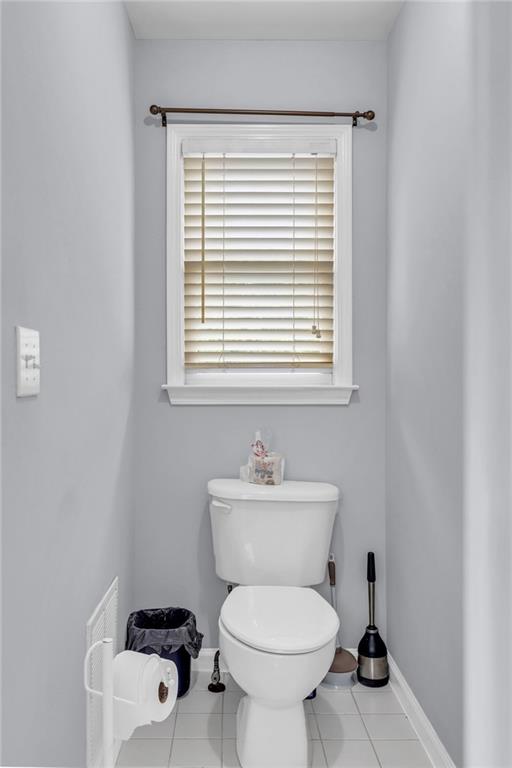 947 Summer Forest Dr, Suwanee, GA 30024 - bathroom featuring toilet, tile patterned flooring, and baseboards