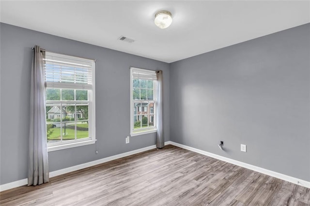 947 Summer Forest Dr, Suwanee, GA 30024 - unfurnished room with wood finished floors and baseboards