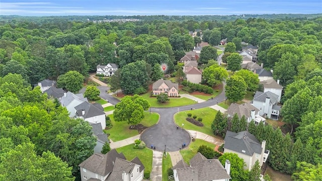 947 Summer Forest Dr, Suwanee, GA 30024 - aerial view of property and surrounding area with nearby suburban area and a heavily wooded area