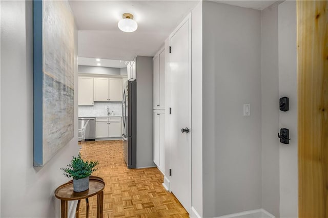 130 26th St NW Unit 415, Atlanta, GA 30309 - hallway with a sink and baseboards