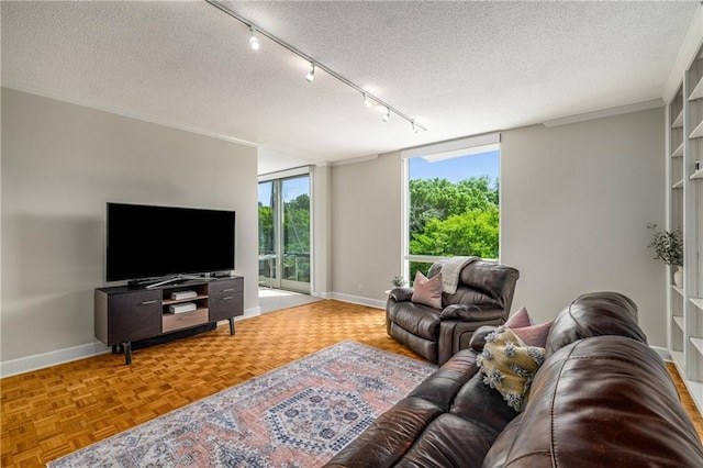 130 26th St NW Unit 415, Atlanta, GA 30309 - living area with a textured ceiling and rail lighting