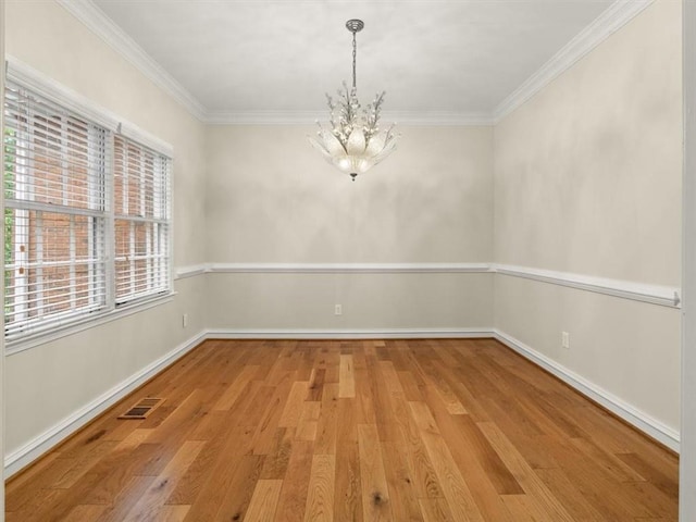 4515 N Slope Cir, Marietta, GA 30066 - unfurnished room with ornamental molding, visible vents, wood finished floors, and a chandelier