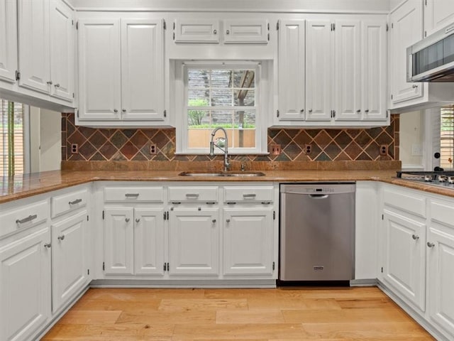 4515 N Slope Cir, Marietta, GA 30066 - kitchen with white cabinetry, appliances with stainless steel finishes, and a sink
