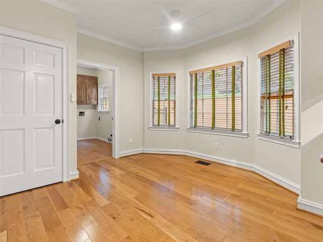 4515 N Slope Cir, Marietta, GA 30066 - spare room featuring crown molding, visible vents, baseboards, and light wood-type flooring