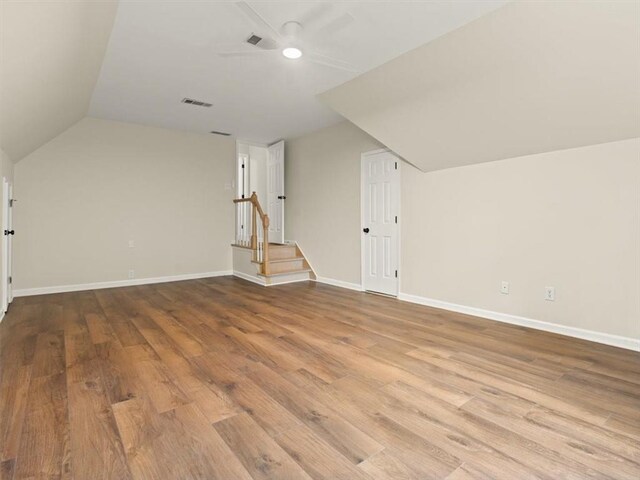 4515 N Slope Cir, Marietta, GA 30066 - additional living space featuring lofted ceiling, wood finished floors, ceiling fan, and visible vents
