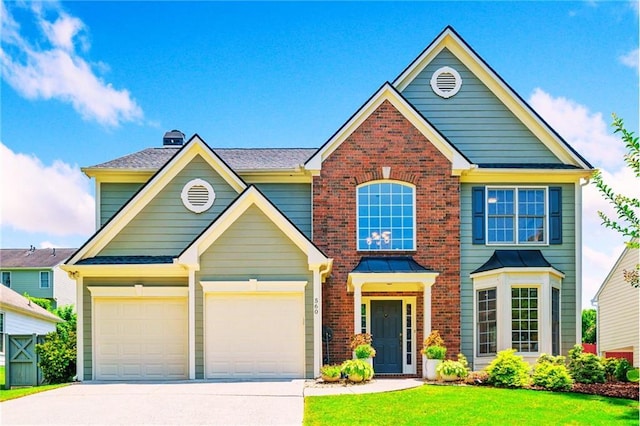 560 Edgehill Pl, Johns Creek, GA 30022 - view of front of property featuring brick siding, driveway, a front yard, and a chimney