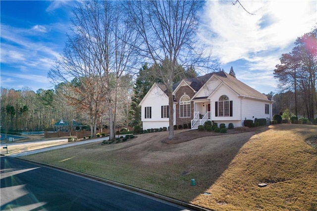 view of front of home with a front yard